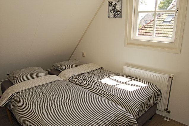 Limosa Wieringen - de secundaire slaapkamer Vakantiewoning Limosa Wieringen - de secundaire slaapkamer met losse boxsprings
