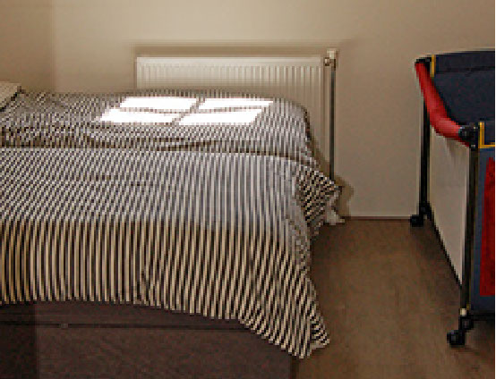 Limosa Wieringen - de secundaire slaapkamer Vakantiewoning Limosa Wieringen - de secundaire slaapkamer met losse boxsprings